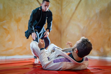 Brazilian jiu jitsu training sparing specific drill BJJ athletes working on the open guard pass...