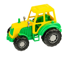 Green Tractor. Toy for children. Toy tractor on a white background.