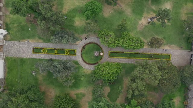 Aerial drone vertical shot of the garden next to the Transfiguration Agustinian Convent in Malinalco, Mexico