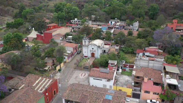 Aerial Drone video of a colonial church in the colorful town of Malinalco, Mexico