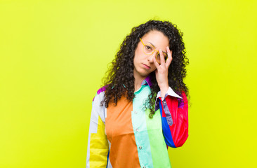young pretty woman feeling bored, frustrated and sleepy after a tiresome, dull and tedious task,...