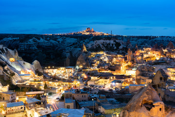 Goreme town on after twilight in Cappadocia cityscape and streetlights view at the sunset...