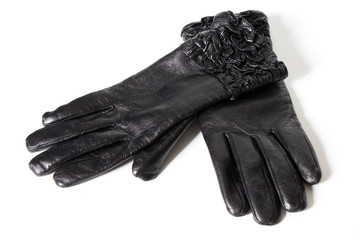Ladies black leather gloves isolated
