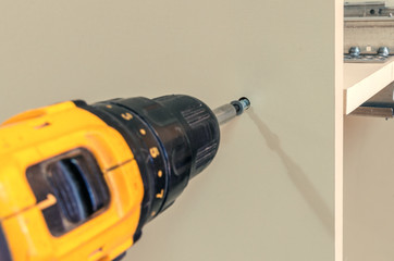 Assembly of hard furniture, close-up drawers for drawers