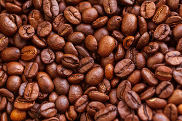 Fototapeta premium Roasted aromatic brown coffee beans background