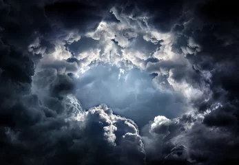 Foto op Aluminium Hole in the Dramatic Clouds © Sabphoto