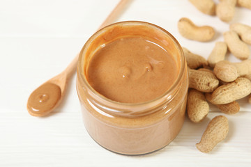 creamy peanut butter on the table. Peanut paste.