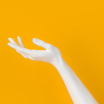 White Open Hand Sculpture Giving, Holding, Take Or Showing Something Gesture Isolated On Yellow Background, 3d Illustration,