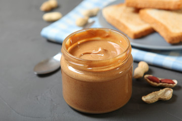 creamy peanut butter on the table. Peanut paste.