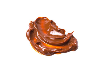 Melted tasty caramel splashes isolated on white background.