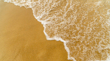  waves on a sandy beach