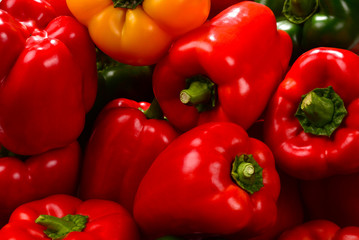 Fresh red, green, yellow bell pepper background.