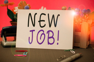 Conceptual hand writing showing New Job. Concept meaning recently having paid position of regular employment Flowers and writing equipments sheet above textured backdrop