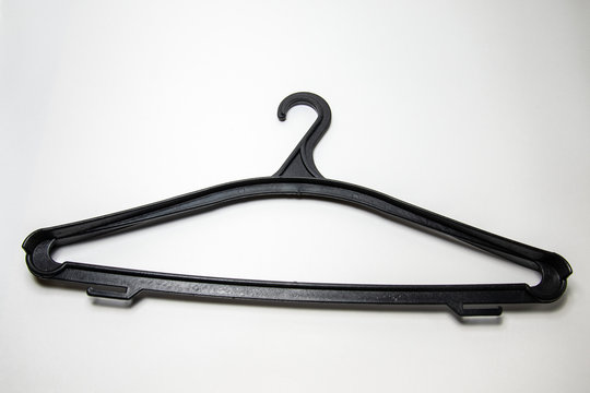 Plastic Black Coat Hanger On White Background