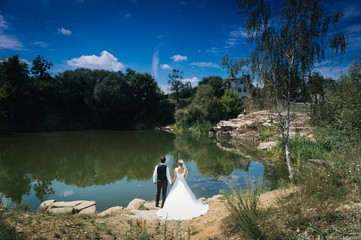 wedding/couple looking at beautifull landscape