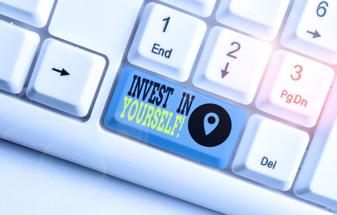 Conceptual hand writing showing Invest In Yourself. Concept meaning nvesting in a coach or a...