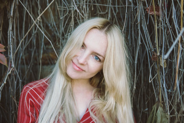 young beautiful blonde in a red dress