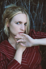 young beautiful blonde in a red dress