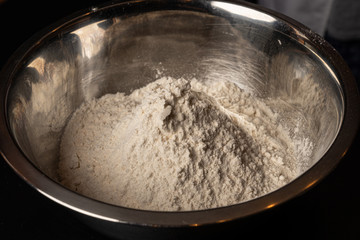 Flour in a metal bowl