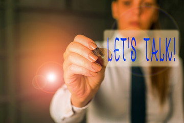Writing note showing Let S Talk. Business concept for they are suggesting beginning conversation on...
