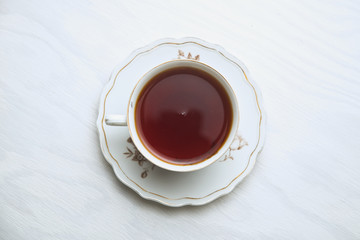 White porcelain tea cup on a white background