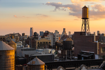 Summer Sunset light on Chelsea rooftops with water towers, Manhattan, New York City, NY, USA - 298923885