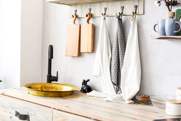  kitchen interior, sink kitchen towels and dishes in the interior