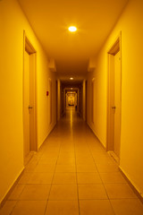 empty long corridor with lighting