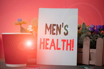 Word writing text Men S Health. Business photo showcasing state of complete physical mental and social well being by analysis Flowers and stationary plus plain sheet with paper big cup above a table