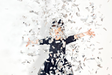 Party, holidays, new year and celebration concept - Female child throwing confetti.