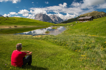 Fototapeta premium Man is relaxing in the Dolomites
