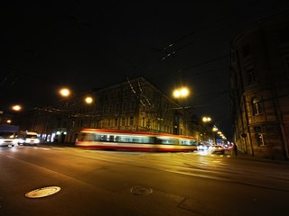 Transport in motion at night in St. Petersburg, Russia