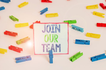 Word writing text Join Our Team. Business photo showcasing inviting someone to join in your local group or company Colored clothespin papers empty reminder white floor background office