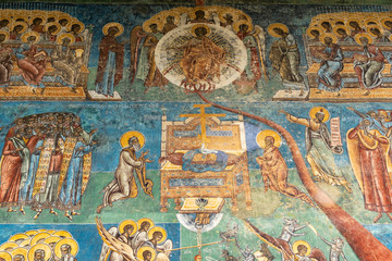 Fototapeta na wymiar Romania, Voronet, 15 September 2019 - Voronet Monastery, Region Suceava, Romania - the church is one of the Painted churches of Moldavia listed in UNESCO's list of World