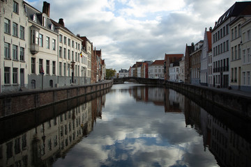 Naklejka premium Bruges. Flanders. Belgium. Canal with historical buildings of the Middle Ages.