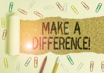 Text sign showing Make A Difference. Business photo showcasing have significant effect or non on demonstrating or situation Stationary and torn cardboard placed above a wooden classic table backdrop