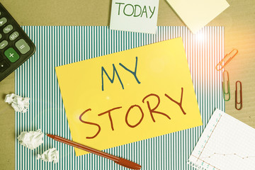 Word writing text My Story. Business photo showcasing the things or situations that have happened to someone in life Striped paperboard notebook cardboard office study supplies chart paper