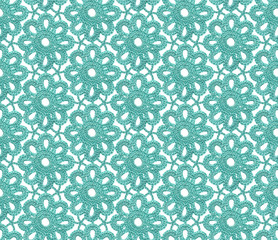 Seamless Irish lace pattern. Crochet. Blue yarn. Knitted snowflakes on a mesh of air loops.