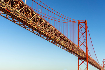 Red bridge, Lisbon, Portugal. Ponte 25 de Abril Suspension Bridge over the Tagus river.