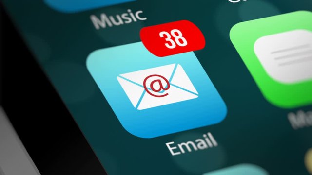 E-mail App Icon with Notifications and Incoming E-mail Counter on Smart Phone Screen. New E-Mail Message Notification on Smart Phone Device