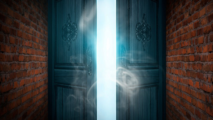 Open doors, brick old walls. Sunlight, open entrance, magic background. Night scene, rays, smoke.
