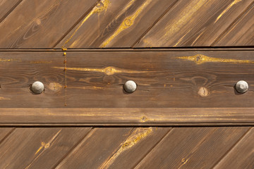 Wooden surface texture with nails and rosin drops