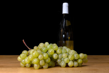 Grape with wine bottle