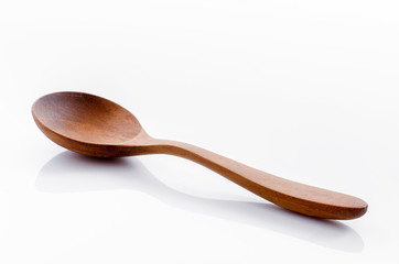 Wooden spoon isolated on white background