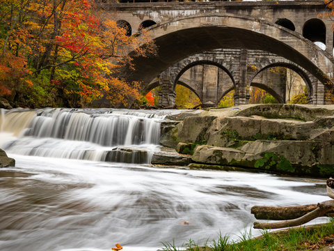 waterfall and arches long exposure in autumn