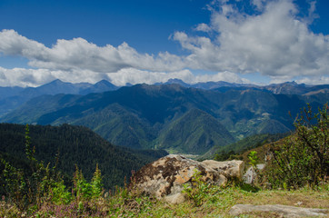 Fototapeta na wymiar The serene view of Himalayan mountains and deep valleys at Chele la pass, Bhutan