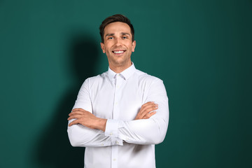 Portrait of male teacher on color background. Space for text