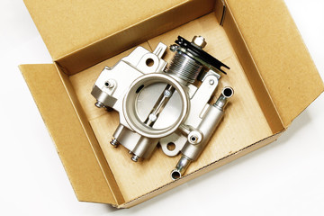 new car throttle valve on white background