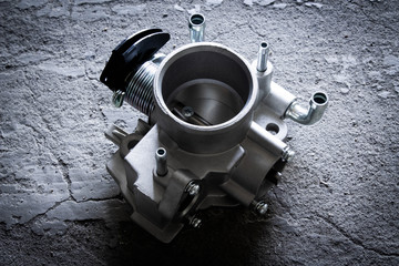 new car throttle valve on white background
