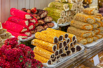 Multi-colored Traditional Turkish Delight (rahat lokum) on the cafe (shop) counter.